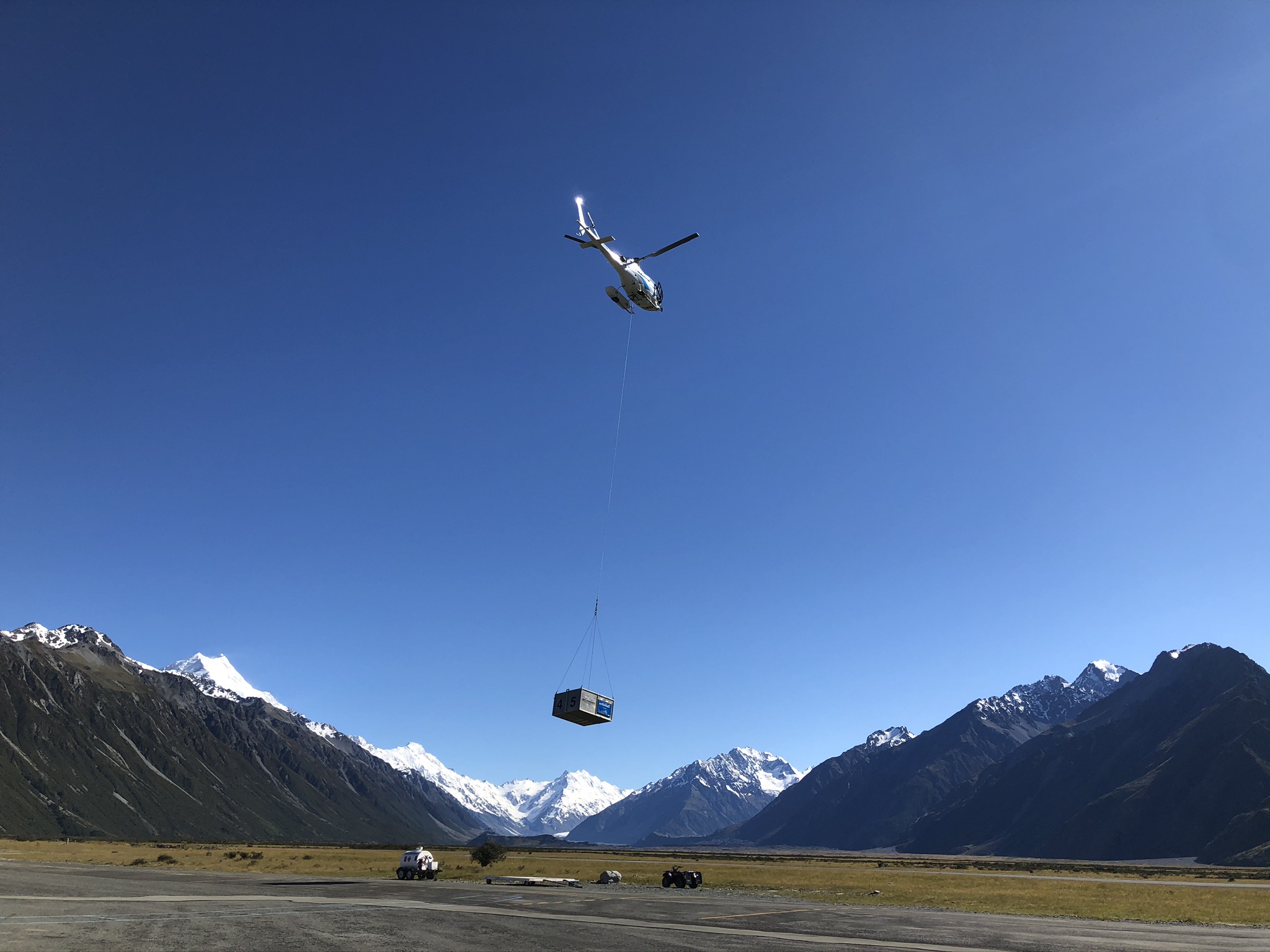 The helicopter taking our bikes away